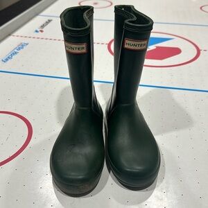 Green hunter boots size 12 has some markings on it